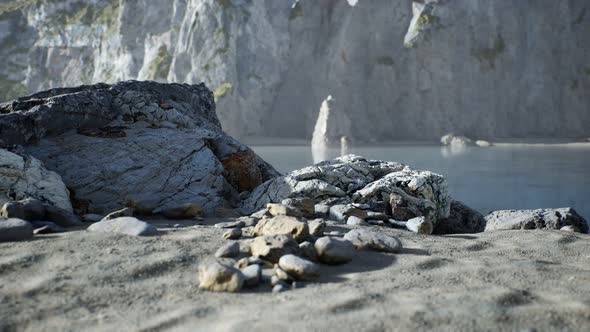 Sand Beach Among Rocks at Atlantic Ocean Coast in Portugal