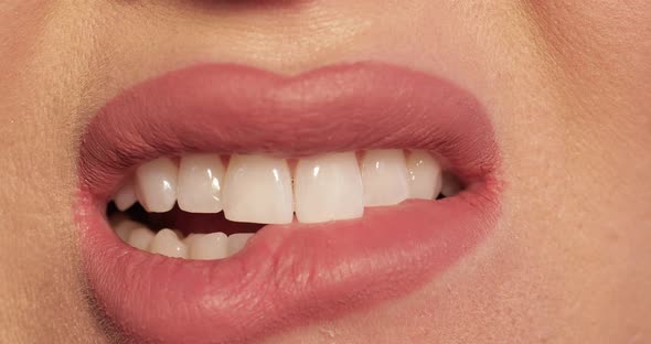 Woman Biting Her Lips Because of Stress