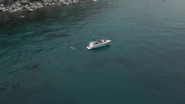 Aerial cinematic view to the motor yacht