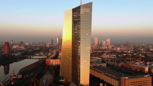 Frankfurt ECB Skyline Aerial Shot at early sunrise reflecting sun