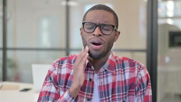 Portrait of Sick African Man Having Toothache