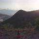 Woman Enjoys Yoga in Lotus Pose Against Mountain at Sunrise - VideoHive Item for Sale