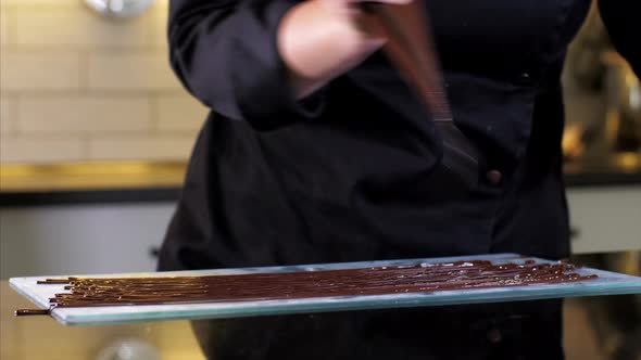 Closeup of Chef is Making Chocolate Desserts in Bird Nest Shaped