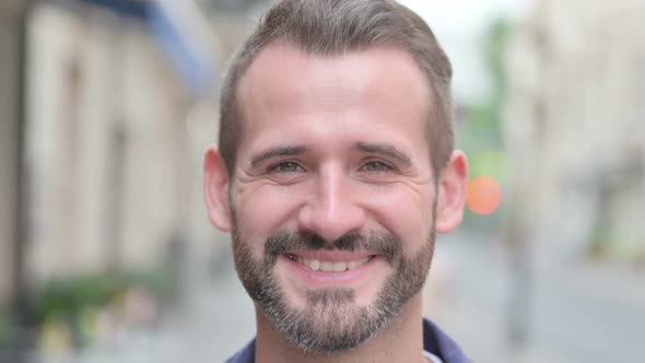 Face Close Up of Man Smiling at Camera