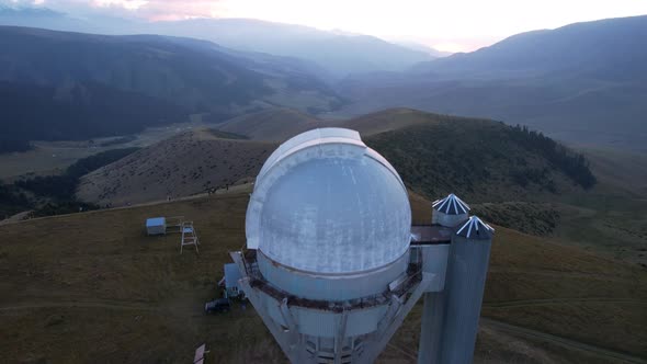 Two Large Telescope Domes at Sunset