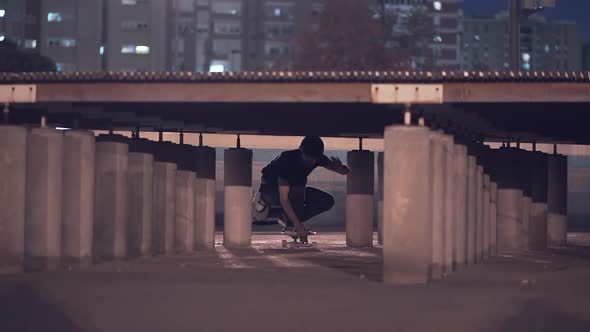 Hipster man skating in city