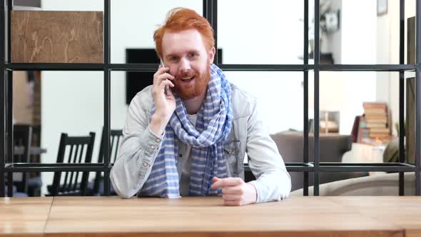 Man Talking on Smartphone, Sitting in Office