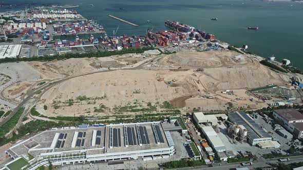 Panoramic aerial view of huge landfill in Tuen Mun, Hong Kong. Chinese industry