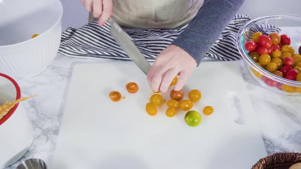 Time lapse. Step by step. Cutting vegetables on a white cutting board to make a one-pot pasta recipe