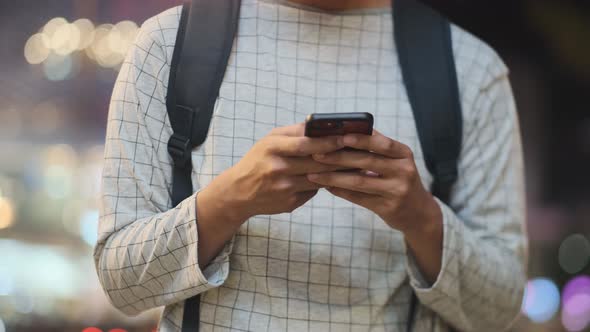 Close up of man using mobile phone.