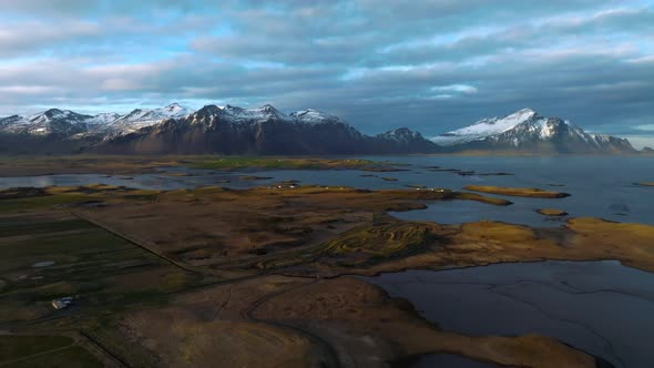 Fantastic Aerial Views of the Landscape in Iceland with Vestrahorn Mountains on the Horizon