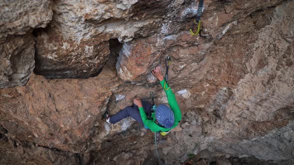 Slow Motion of Strong Woman Rock Climber Confidently Rock Climbs Mountain Fitness Lifestyle