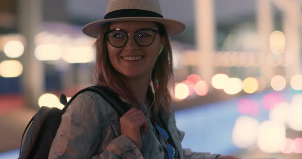 Close Up Portrait of Attractive Smiling Young Woman Having Fun at Night City