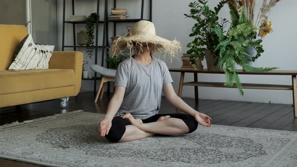 A Young Indian Woman Is Standing in a Yoga Lotus Pose, A Girl Is Doing An Exercise, Sitting