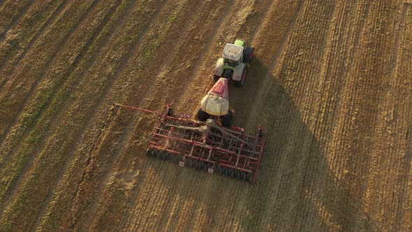 Aerial Footage of Tractor Sowing Rapeseed