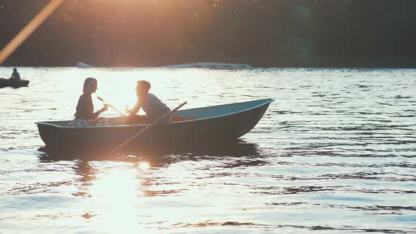 Kissing couple in a boat