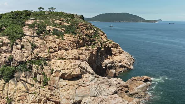 Island with Rocky Coast, Hong Kong UNESCO Global Geopark in Shek O, Drone View