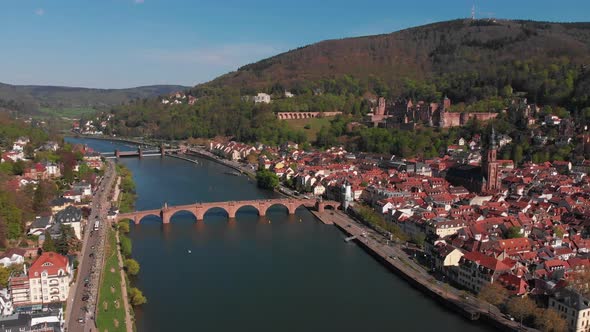 Pedestrian bridge over the river. Beautiful top view of the Heidelberg castle.