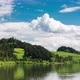 Green Hills at the Lake with Cloudscape - VideoHive Item for Sale