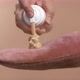 Applying Selftanner Mousse to a Rose Massage Glove - VideoHive Item for Sale