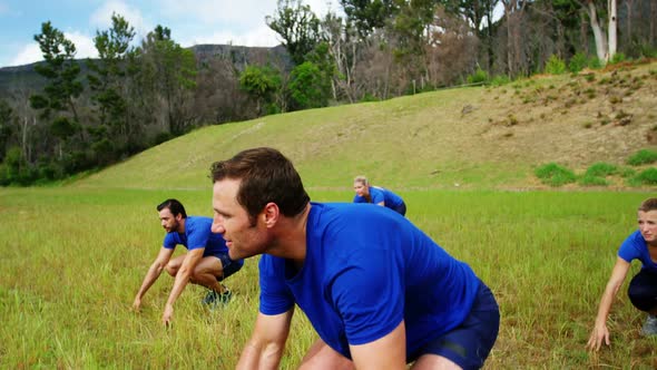 Fit people performing stretching exercise 4k