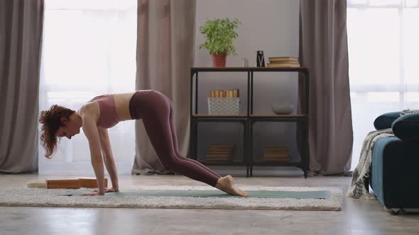 Sporty Woman is Performing Yoga Asanas in Apartment Morning Workout of Housewife Healthy Lifestyle