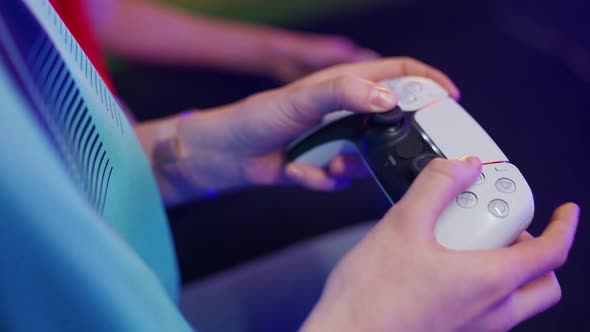 Esports Competition Gamers Plays a Video Game on a Game Console Closeup View of Hands Holding the