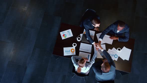 Business team performing an action at the table