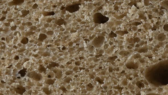 A slice of brown bread, up close