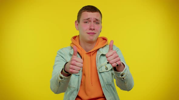 Teen Stylish Man in Denim Jacket Showing Thumbs Up and Nodding in Approval Successful Good Work