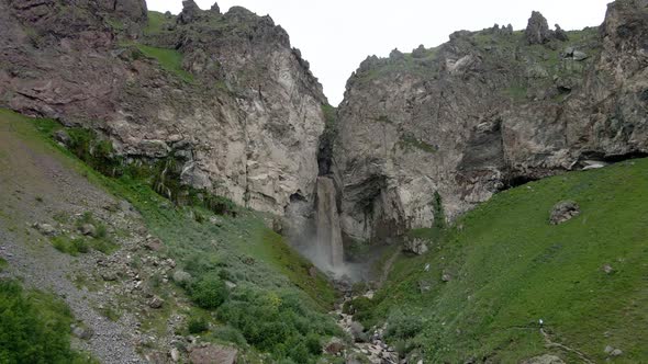 Dirty Waterfall Sultan High in the Mountains Near Elbrus in Summer