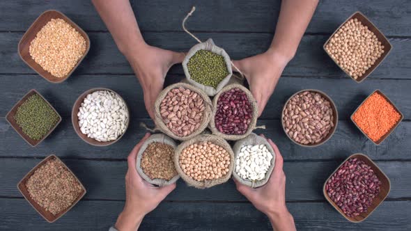 Legumes on Dark Wooden Ecological Background.