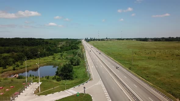 Trucks And Cars On A New Rural Highway