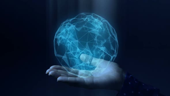 Blue Hologram Magic Sphere Rotating In Woman Hands