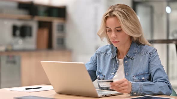 Online Shopping Loss on Laptop By Young Woman