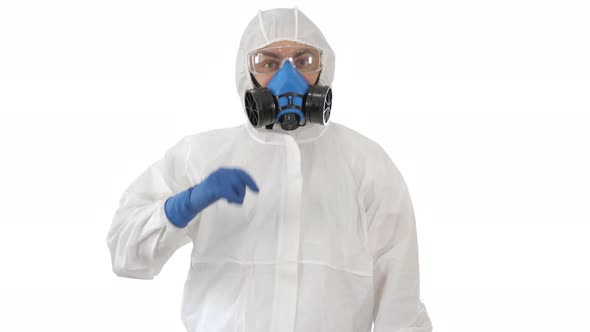 Doctor Wearing Hazard Suit Pointing with Finger Up Wanting Your Attention on White Background