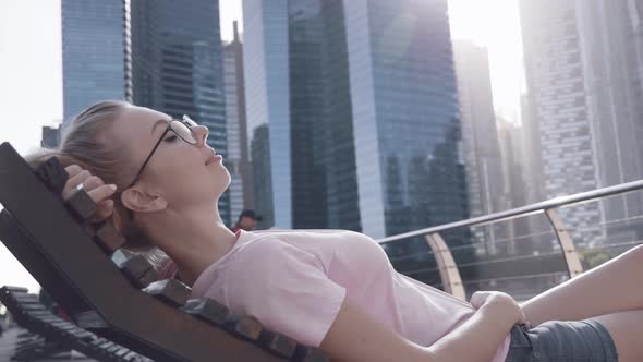 Woman Chilling on the Deck