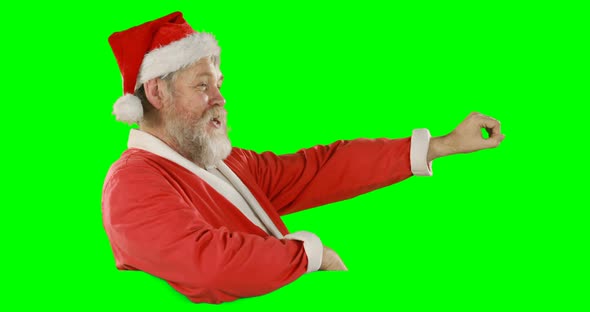 Portrait of happy santa claus singing song