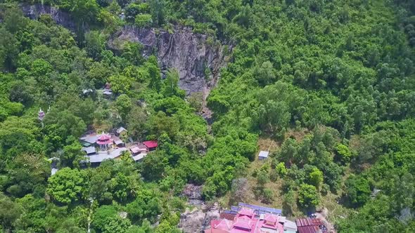 Drone Camera Moves From Buddhist Temple Complex To Hills