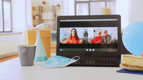 Laptop with Family Having Virtual Birthday Party