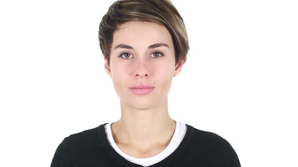 Serious Woman Looking at Camera in Studio on White Background