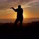 Men Warrior Monk Practicing Silhouette Tai Chi Karate Kung Fu on the Rocky Stones Horizon at Sunset - VideoHive Item for Sale