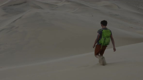 Hiker descends Eureka Dunes - Death Valley National Park