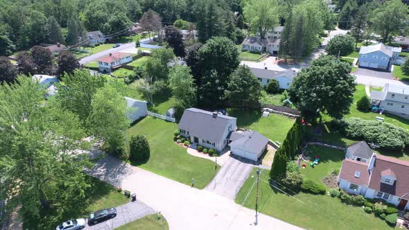 4K  Fly Over A Suburban NH Neighborhood In Summer