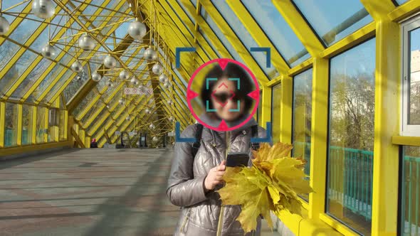 Artificial Intelligence Scans the ID of a Middleaged Woman Walking Across a Bridge
