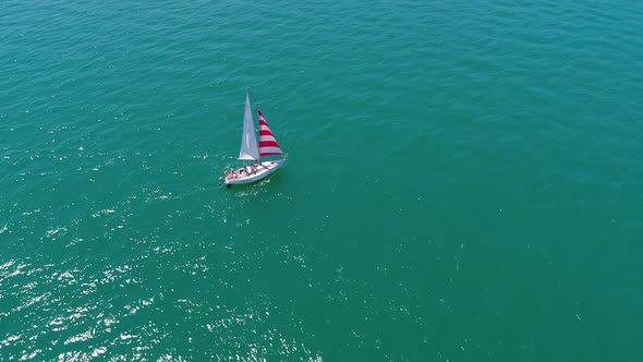 Seascape with sail boat. Nature seascape with sail boat cruising at sea bay