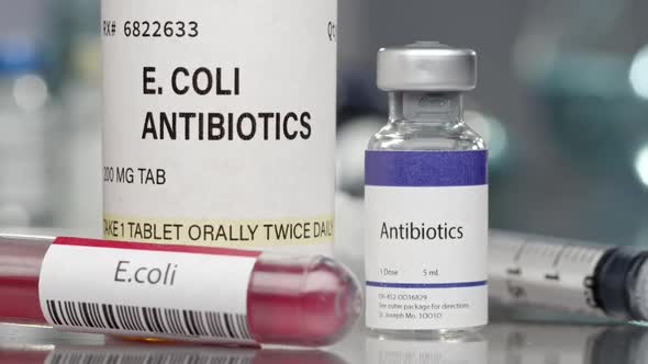 E.coli antibiotics and antibodies in medial lab with syringe