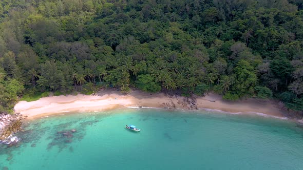 Banana Beach Phuket Thailand White Sandy Beach with Palm Trees View From Drone Aerial View at Beach