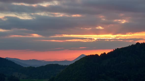 Sunset in Cloudy Weather Forest Hilly Landscape  Timelapse