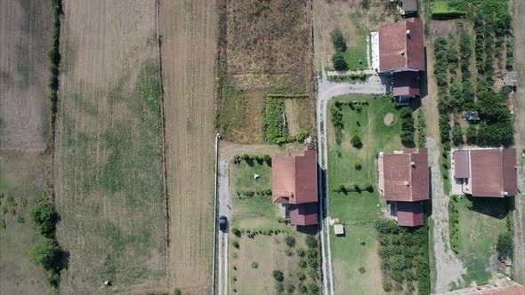 Top View of Houses and Farm Land in a Small Town in the Balkans